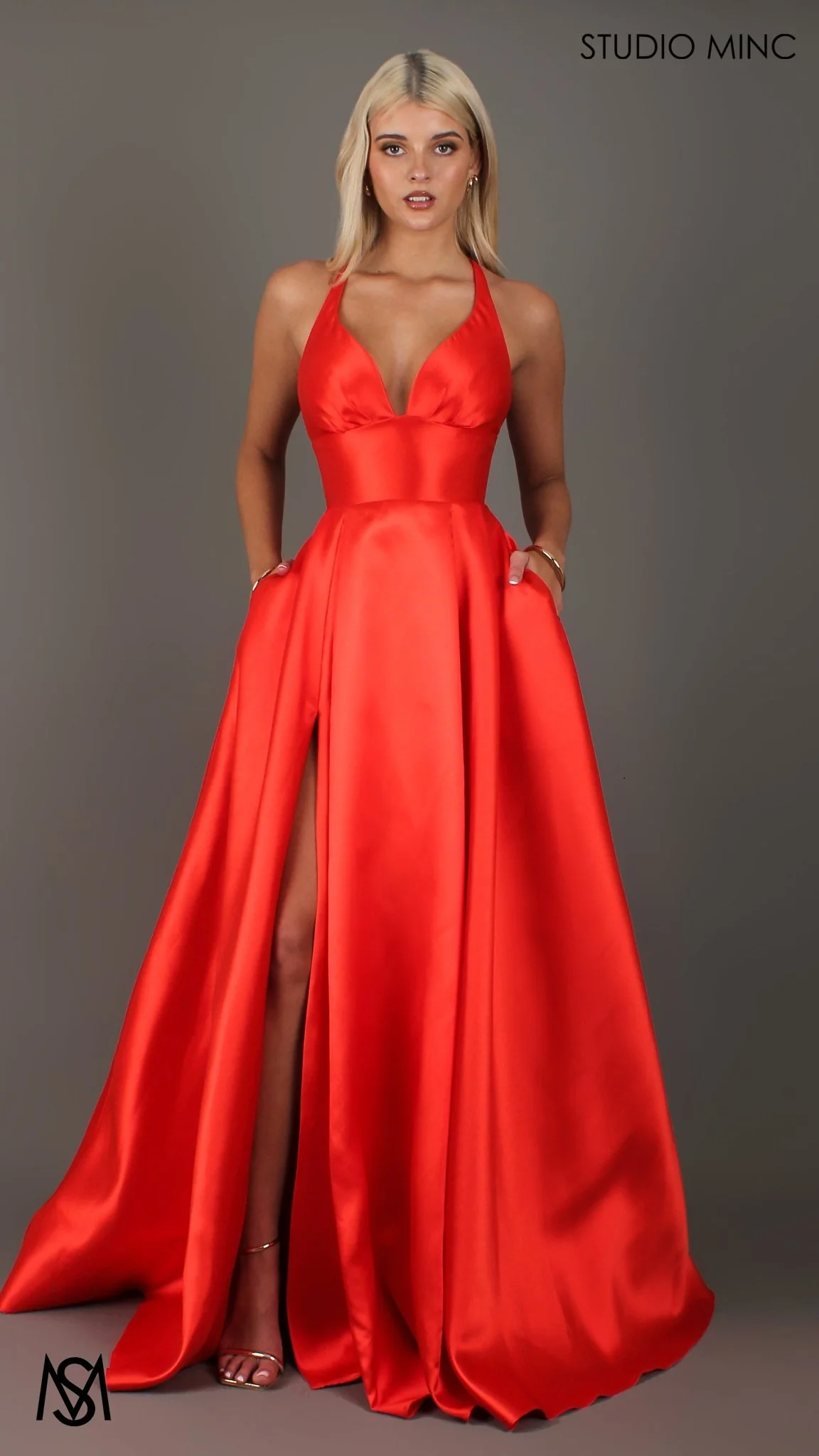 Riviera - Orange formal dress | V Plunge neckline, backless Satin Gown with Pockets and leg slit - Image 3